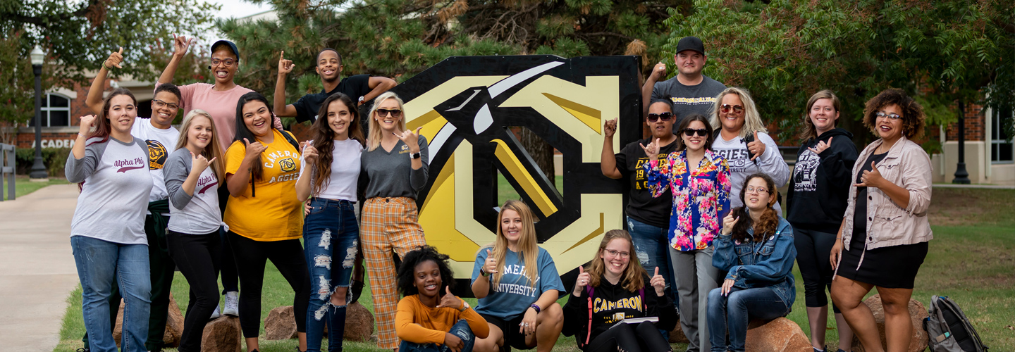 Cameron Students posing for a picture on Campus