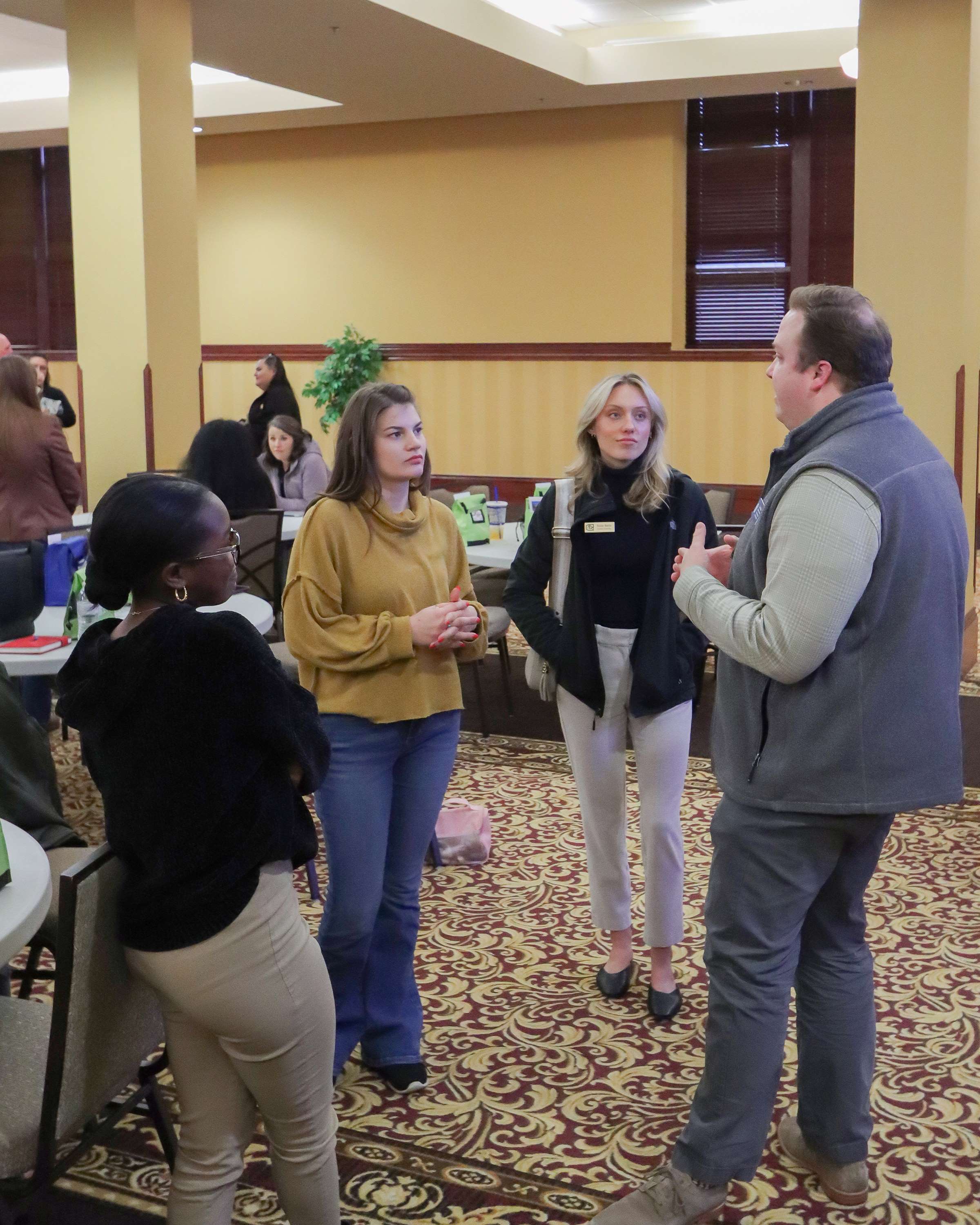 Students speaking to city employee.