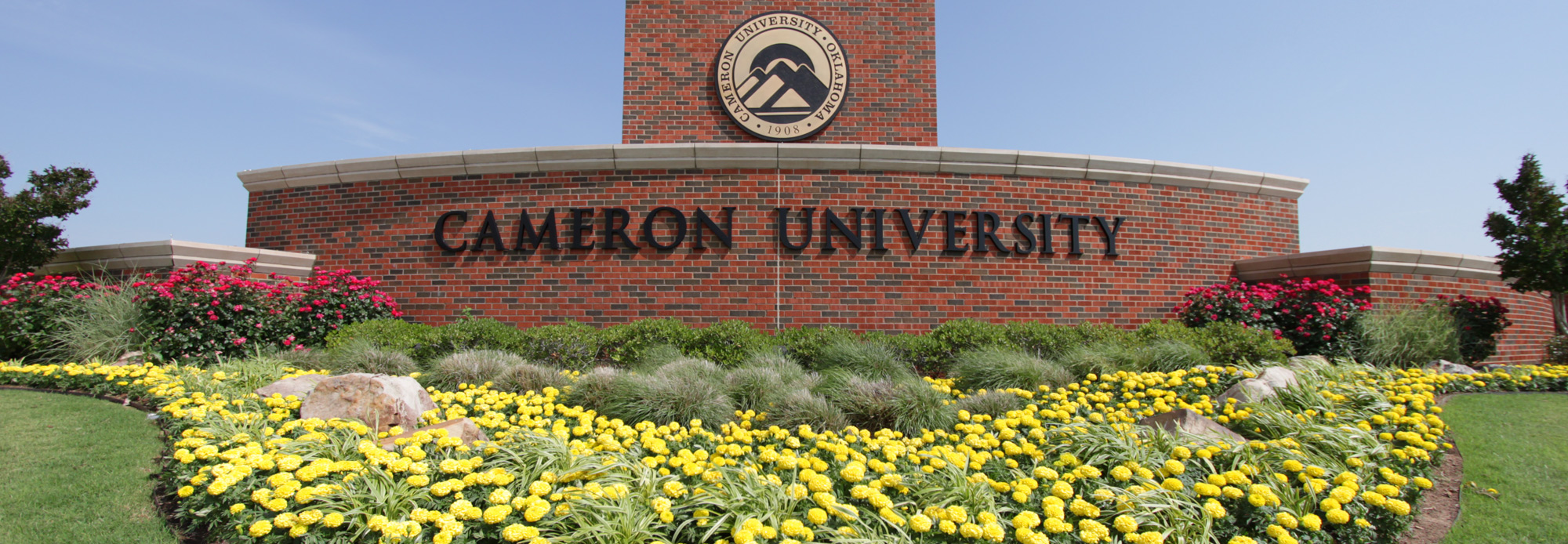 Cameron Students posing for a picture on Campus