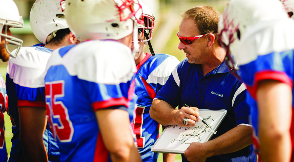 coach with team