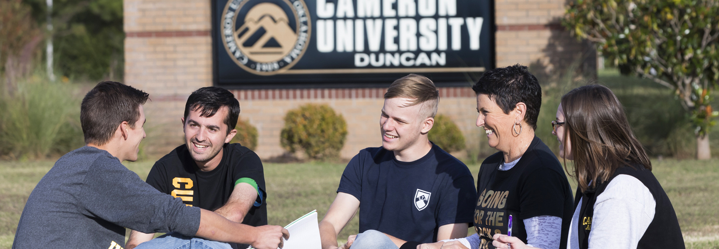 Cameron Students posing for a picture on Campus