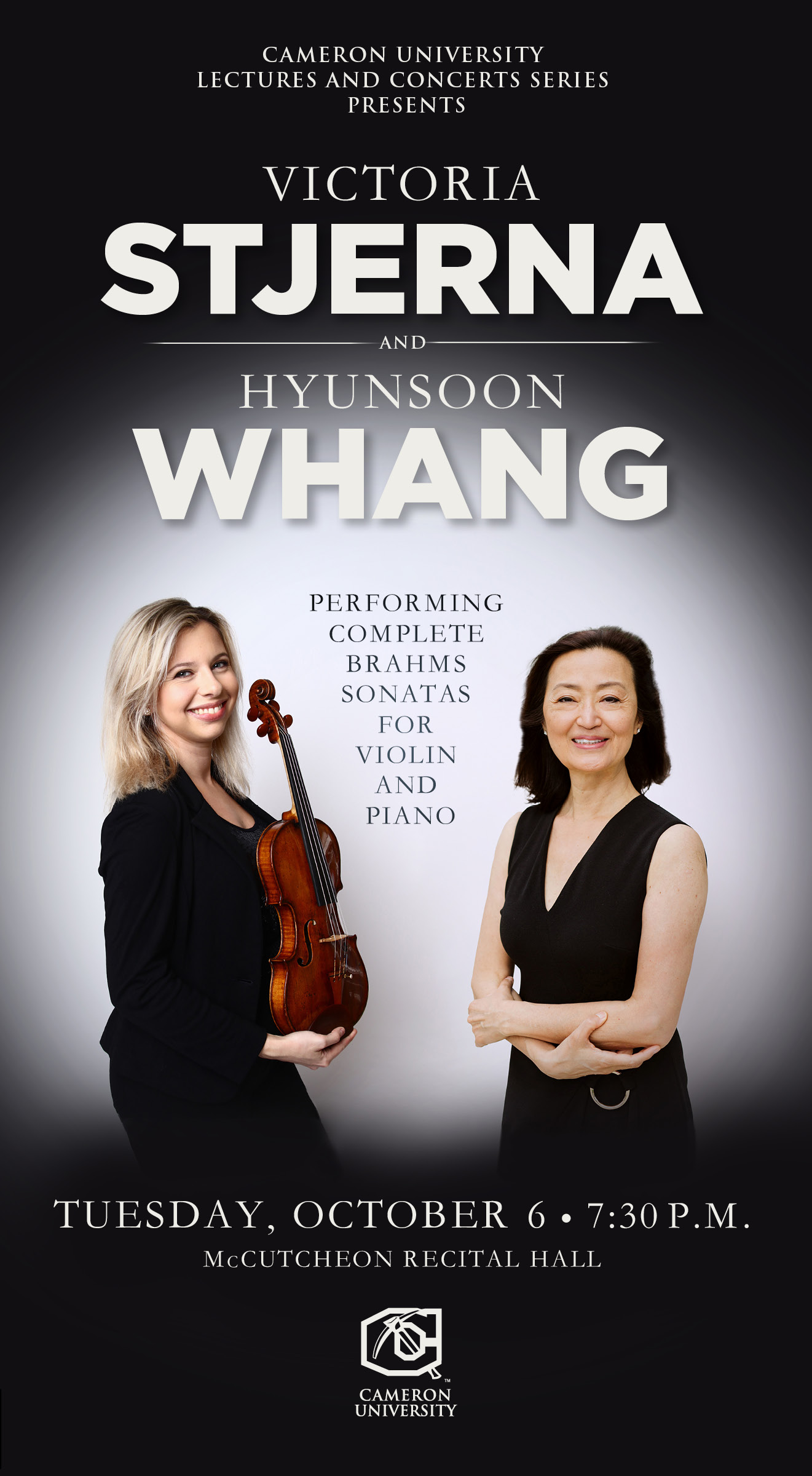 Victoria Stjerna and Hyunsoon Whang posing together. Victoria is holding a violin.